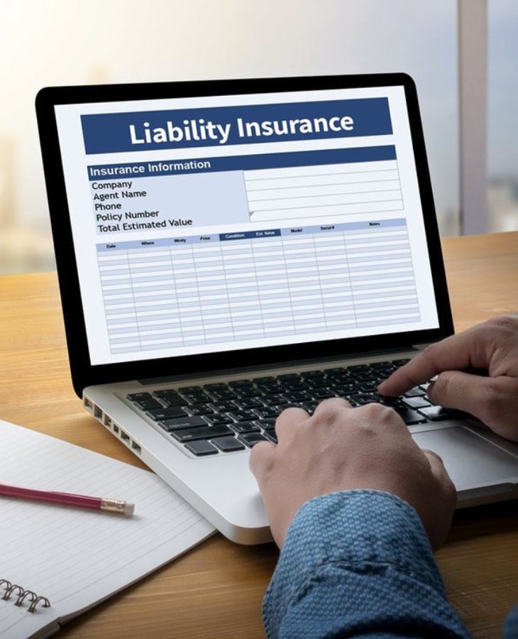 A Laptop Screen with liability insurance Information