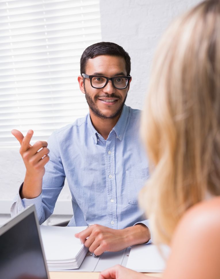 An Agent Explaining Business Insurance In Atlanta An Agent Explaining Business Insurance In Atlanta